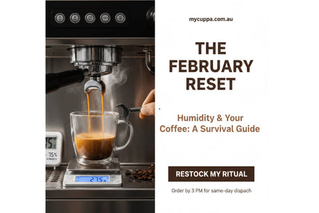 A barista dialing in an espresso shot on a scale with a humidity monitor in the background, featuring the mycuppa February Reset theme.